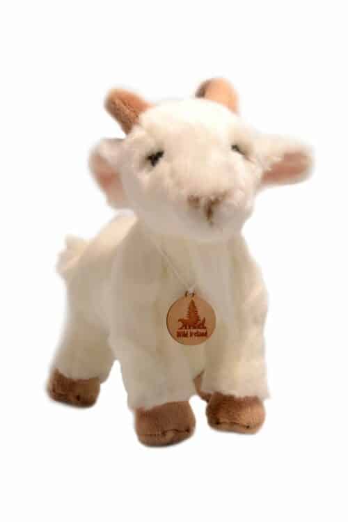 Wild Ireland - A plush goat toy with white fur and light brown ears and hooves. It has a small, round nose and is wearing a wooden tag with a tree and the words Wild Ireland. The background is plain white.