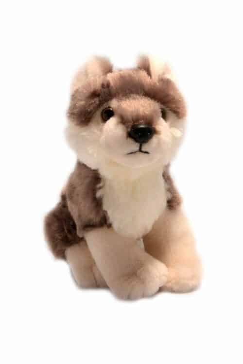 Wild Ireland - A plush toy resembling a wolf, with soft brown and cream fur. It has pointed ears, dark eyes, and a black nose. The toy is positioned in a sitting stance against a plain white background.
