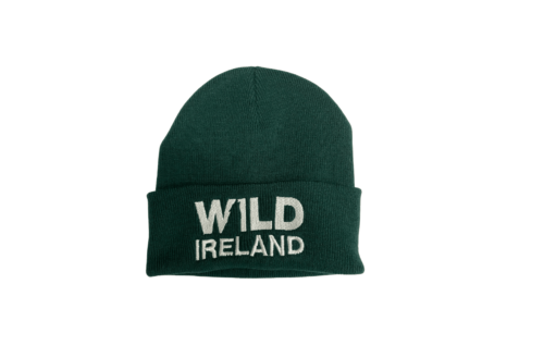 Wild Ireland - A dark green knitted beanie with the words WILD IRELAND embroidered in white on the front fold. The background is plain white.