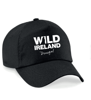 Wild Ireland - The Baseball Cap Black features WILD IRELAND Donegal in white embroidery with an animal silhouette in WILD, a curved brim, and an adjustable back.